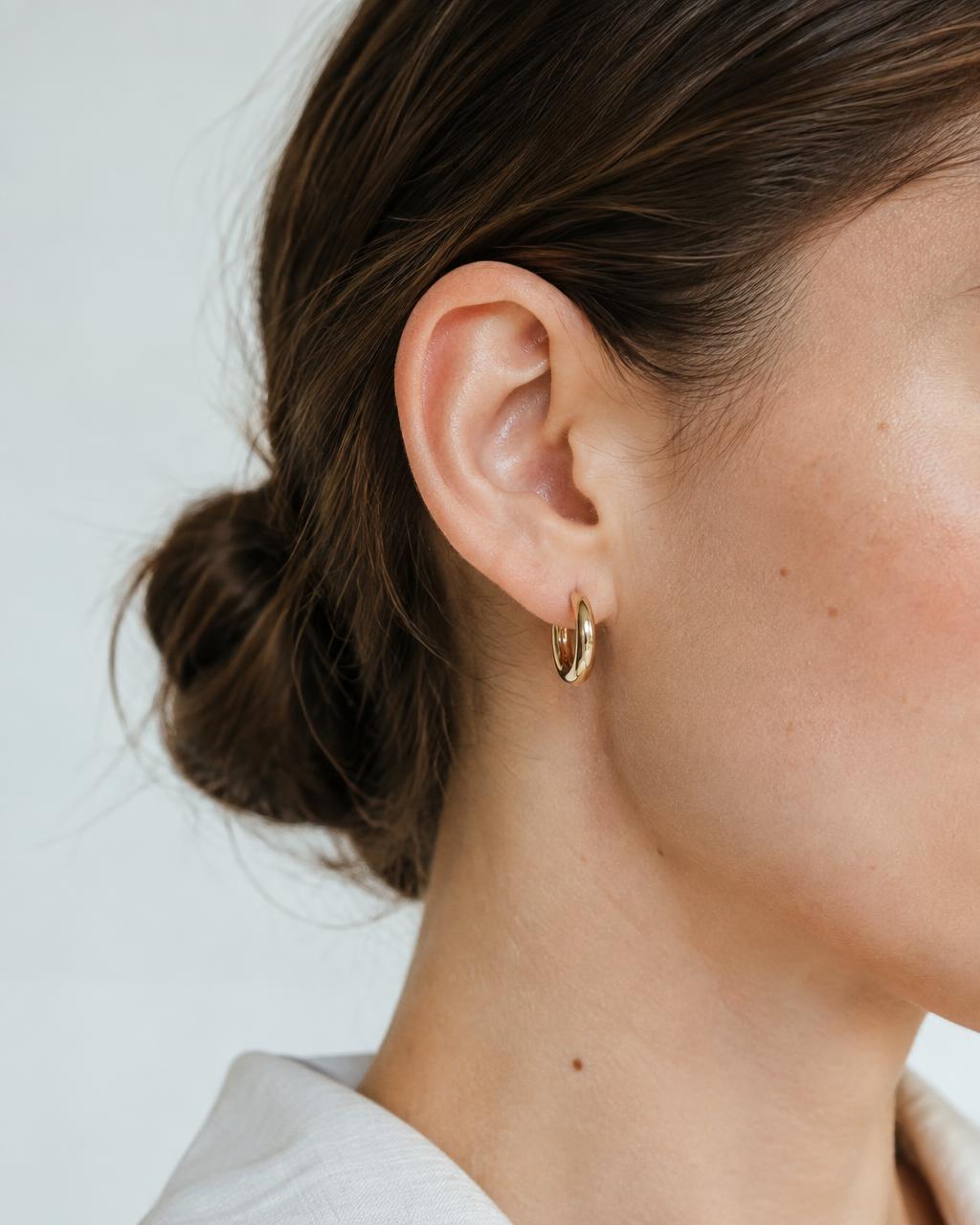 Customer wearing ORIGIN jewelry